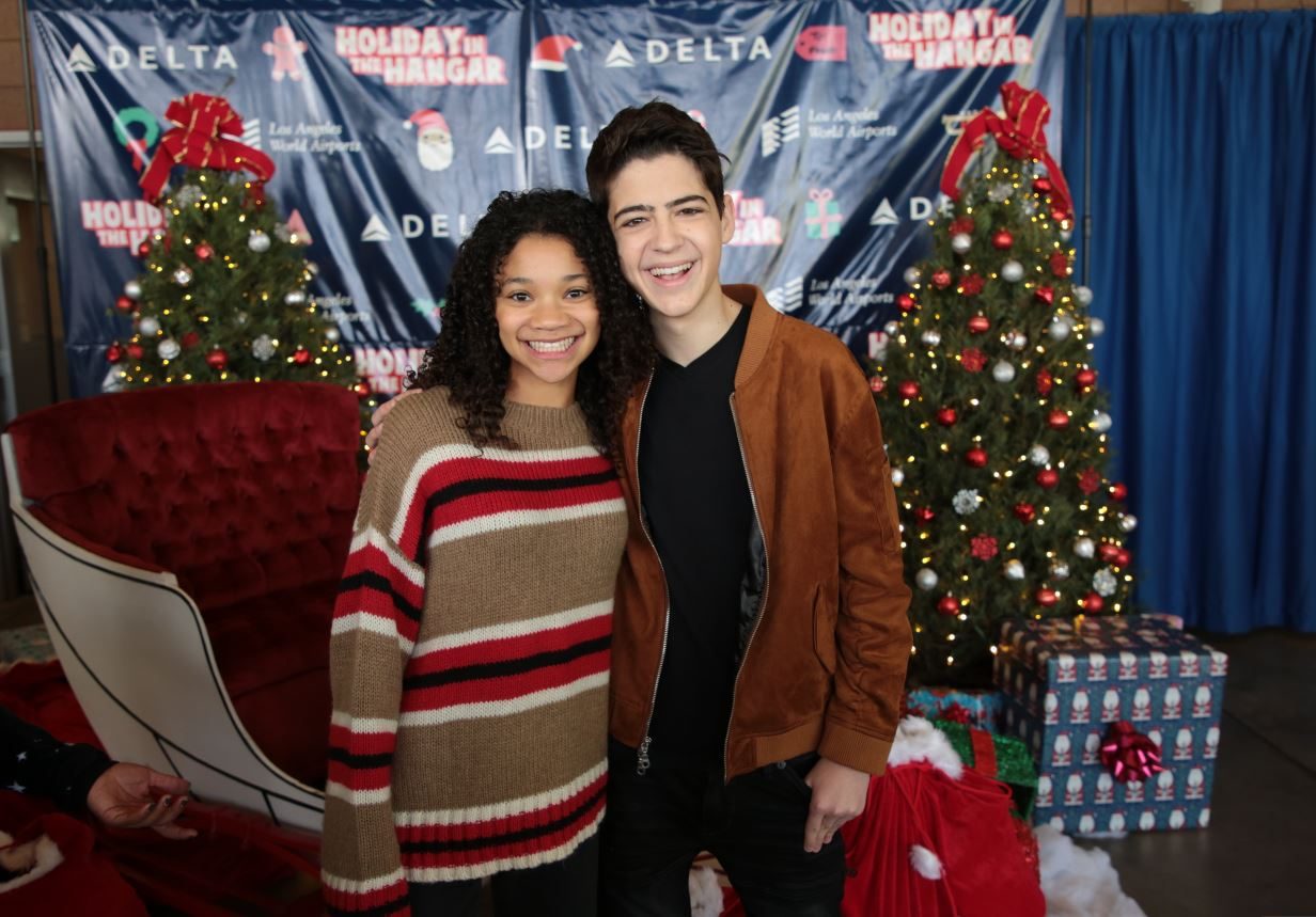 Disney Stars Joshua Rush and Kylee Russell Spread Holiday Cheer at the 8th Annual Holiday in the Hangar by Delta Airlines 1 joshua rush and kylee russell 8th annual holiday in the hangar