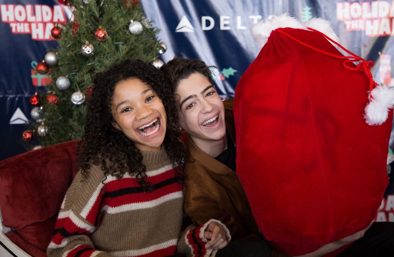Disney Stars Joshua Rush and Kylee Russell Spread Holiday Cheer at the 8th Annual Holiday in the Hangar by Delta Airlines 2 joshua rush and kylee russell 8th annual holiday in the hangar