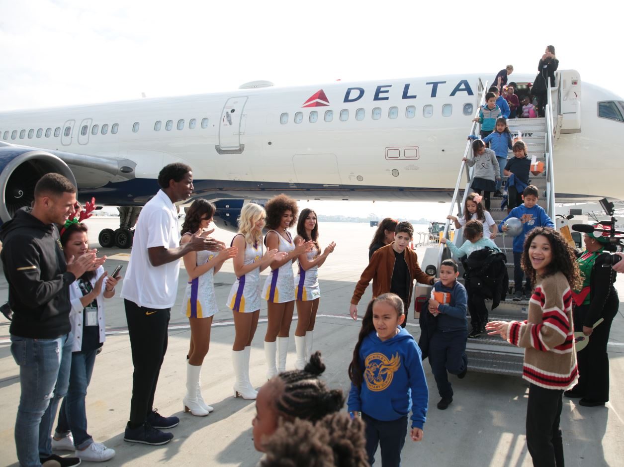 Disney Stars Joshua Rush and Kylee Russell Spread Holiday Cheer at the 8th Annual Holiday in the Hangar by Delta Airlines 5 joshua rush and kylee russell 8th annual holiday in the hangar