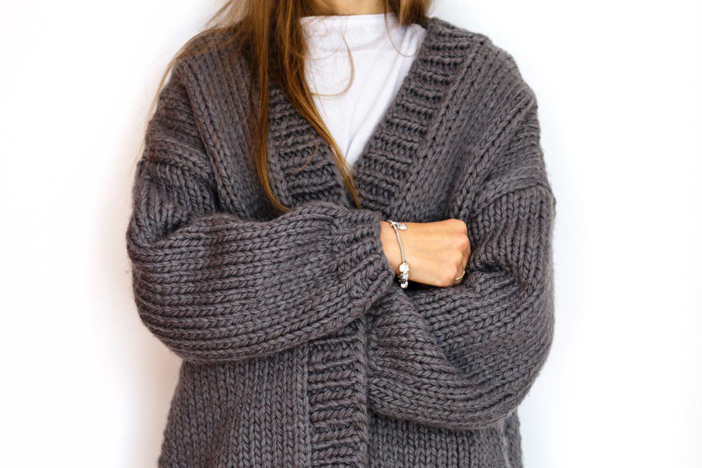 Items Every Girl Needs in Her Wardrobe for High School 1 nominated woman isolated on white background knitted sweater casual style fashionable warm